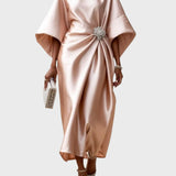 Весела - рокля със странно плисиране и декоративна катарама