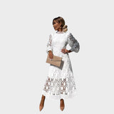 Надежда - Чипкана рокля с обемни ръкави и висока яка